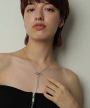 甘くなりすぎないリボンデザインで女性らしさ◎